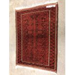 A GOOD QUALITY BELOUCH RUG. 176 x 126cms