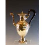 A FRENCH SILVER COFFEE POT AND HINGED COVER, DISCHARGE MARKS, THE BALUSTER SHAPE WITH AN EBONY