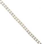 A DIAMOND TENNIS LINE BRACELET. APPROX STATED ESTIMATED DIAMOND WEIGHT 2.30cts. LENGTH 18cms. WEIGHT