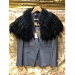 A TED BAKER LADIES SUIT COMPRISING OF A SKIRT SIZE 3 AND A JACKET SIZE 4, TOGETHER WITH A JENNY