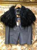 A TED BAKER LADIES SUIT COMPRISING OF A SKIRT SIZE 3 AND A JACKET SIZE 4, TOGETHER WITH A JENNY