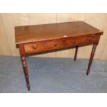 A 19th C. MAHOGANY TWO DRAWER SIDE TABLE ON TURNED CYLINDRICAL LEGS TAPERING TO SPINDLE FEET. W 96 x