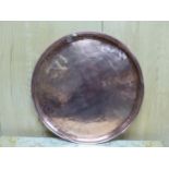 A COPPER CIRCULAR TRAY. Dia. 85cms.