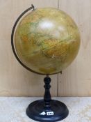 AN EARLY 20th C. GEOGRAPHIA 12 INCH TERRESTIAL GLOBE ON AN EBONISED STAND