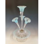 AN EARLY 20th C. GLASS EPERGNE, THE TOPS OF THE FOUR TRUMPET VASES AND THE RIM OF THE UNDERDISH