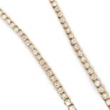 A HALLMARKED 9ct GOLD GRADUATED DIAMOND LINE NECKLACE. LENGTH 46cms. APPORX ESTIMATED DIAMOND WEIGHT