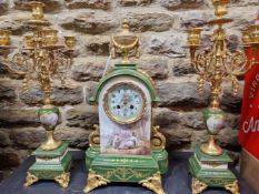 A LATE 19th/EARLY 20th C. FRENCH APPLE GREEN AND GILT PORCELAIN CLOCK GARNITURE, THE CLOCK WITH