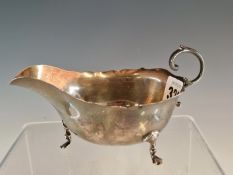 A SILVER TRIPOD SAUCE BOAT BY ATKINSONS, BIRMINGHAM 1940, TWO SILVER SWEETMEAT DISHES, BIRMINGHAM