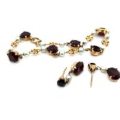 A HALLMARKED 9ct GOLD GARNET AND PEARL BRACELET WITH MATCHING EARRINGS. DATED 1962 -63, BIRMINGHAM