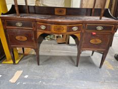 A 19th C. MAHOGANY SIDEBOARD, THE FRONT EDGE OF THE TOP WITH LINE INLAY, THE CENTRAL BOW FRONT