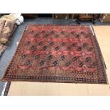 AN ANTIQUE AFGHAN BOKHARA CARPET. 270 x 245cms