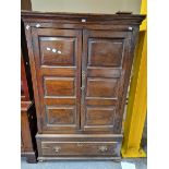 AN 18th C. AND LATER OAK CUPBOARD, THE DOORS EACH WITH THREE PANELS ABOVE A SINGLE LONG DRAWER. W 97