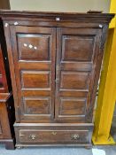 AN 18th C. AND LATER OAK CUPBOARD, THE DOORS EACH WITH THREE PANELS ABOVE A SINGLE LONG DRAWER. W 97