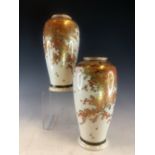 A PAIR OF SATSUMA VASES, THE OVOID BODIES PAINTED WITH AUTUMNAL MAPLE BRANCHES, SHIMIZU MON AND