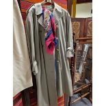 A LADIES BURBERRY TRENCH COAT, TOGETHER WITH TWO SCARVES