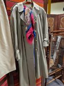 A LADIES BURBERRY TRENCH COAT, TOGETHER WITH TWO SCARVES