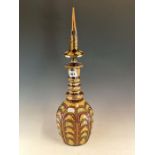 A LATE 19th C. DECANTER AND SPIRE FORM STOPPER DECORATED IN THE OTTOMAN TASTE WITH CRESCENTS OF