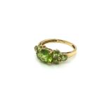 A HALLMARKED 9ct GOLD SEVEN STONE GEMSET RING. FINGER SIZE S. WEIGHT 3.22grms.