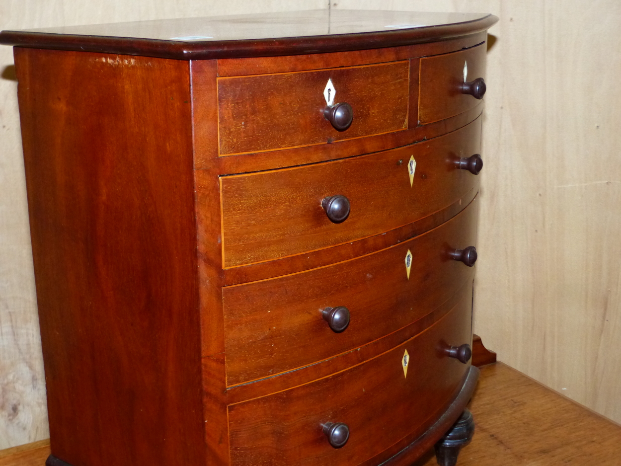 A 19th C. MAHOGANY MINIATURE BOW FRONT CHEST OF TWO SHORT AND THREE GRADED LONG DRAWERS, EACH WITH - Image 3 of 6