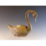 AN ELECTROPLATE SWAN WITH RED GLASS EYES, ITS WINGS SPREADING TO REVEAL A NINE HOLE FLOWER VASE. W