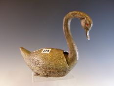 AN ELECTROPLATE SWAN WITH RED GLASS EYES, ITS WINGS SPREADING TO REVEAL A NINE HOLE FLOWER VASE. W