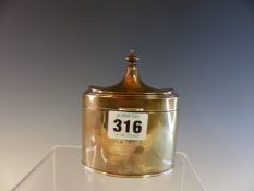 AN OVAL SECTION SILVER TEA CADDY BY THE GOLDSMITHS AND SILVERSMITHS COMPANY, LONDON 1928, THE HINGED