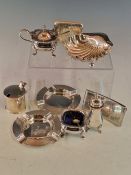 HALLMARKED SILVER ITEMS: A BUTTER SHELL, TWO ASHTRAYS, A MUSTARD, A CARD CASE AND A VESTA, 209.5Gms.