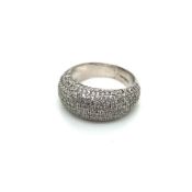 A PLATINUM HALLMARKED AND DIAMOND PAVE SET BOMBE RING. ESTIMATED APPROX DIAMOND WEIGHT 2cts.