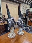 A PAIR OF MEISSEN FIGURES OF MAGPIES CALLING FROM TREE TRUNK PERCHES, CROSSED SWORDS MARKS. H