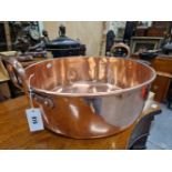 A 19th C. COPPER TWO HANDLED JAM PAN. Dia. 47.5cms.