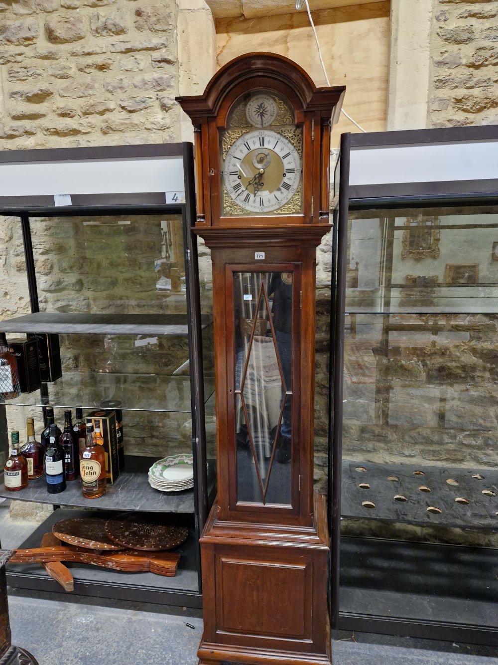 AN EARLY 20th C. MAHOGANY LONG CASED THREE TRAIN CLOCK WITH TUBULAR BELL STRIKE AND CHIME, THE