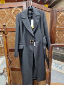 A KAREN MILLEN LADIES LONG BLACK COAT WITH BELT SIZE 16.\