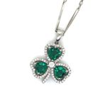 A PLATINUM HALLMARKED, EMERALD AND DIAMOND THREE LEAF CLOVER PENDANT, COMPLETE WITH A PLATINUM