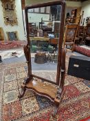 A 19th C. MAHOGANY FULL LENGTH CHEVAL MIRROR, THE COLUMNS SUPPORTING THE RECTANGULAR PLATE ON A