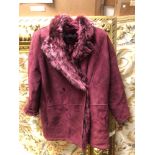 A LOEWE BURGUNDY SHEEP SKINNED FUR LINED JACKET SIZE 44.