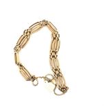 A 9ct HALLMARKED GOLD SHAPED FOUR BAR GATE BRACELET. LENGTH APPROX 18cms. WEIGHT 16.93grms.