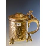 A BERGEN 830 SILVER LIDDED TANKARD INSCRIBED ON THE BASE FOR 1925, THE HINGED LID INSET WITH A