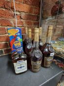 BRANDY: THREE BOTTLES, ONE BOXED, FOUR LITRE BOTTLES AND TWO HALF BOTTLES OF MARTELL