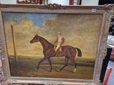A DECORATIVE PICTURE AFTER HERRING OF A HORSE AND JOCKEY OUT ON THE HEATH. 72 x 95cms.