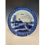 AN 18th C. CHINESE BLUE AND WHITE VAN FRYTOM PLATE PAINTED WITH THREE FIGURES WALKING NEAR A PORT.