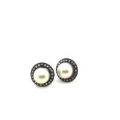 A PAIR OF VINTAGE CULTURED PEARL AND DIAMOND STUD EARRINGS. THE EARRINGS UNHALLMARKED, ASSESSED AS