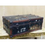 A LEATHER CORNERED BLUE CANVAS COVERED TRUNK. W 88 x D 53 x H 33cms.