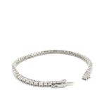 A 9ct HALLMARKED GOLD DIAMOND LINE TENNIS BRACELET. ESTIMATED STATED DIAMOND WEIGHT 2.11cts.