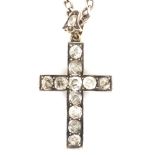 AN ANTIQUE OLD CUT DIAMOND CROSS PENDANT AND CHAIN. THE CROSS SET WITH ELEVEN OLD CUT DIAMONDS