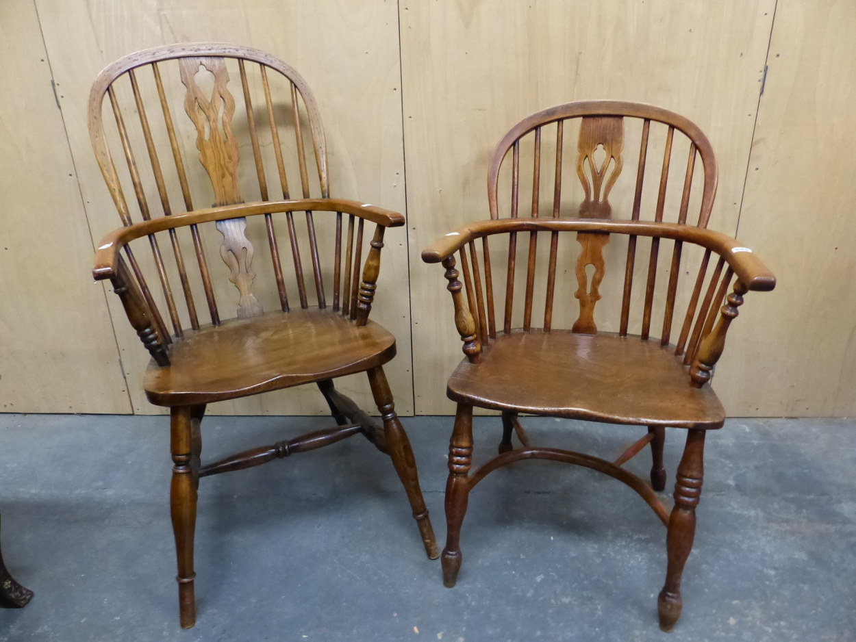 A 19th C. OAK AND ELM LOW BACKED WINDSOR CHAIR WITH CRINOLINE STRETCHER TOGETHER WITH ANOTHER WITH A
