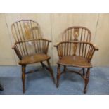 A 19th C. OAK AND ELM LOW BACKED WINDSOR CHAIR WITH CRINOLINE STRETCHER TOGETHER WITH ANOTHER WITH A