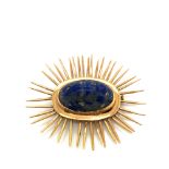 A HANDCRAFTED LAPIS LAZULI STAR BURST BROOCH. WIDTH 5cms. UNHALMARKED, WITH INDISTINCT STAMP TO