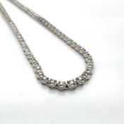 A DIAMOND AND 9ct GOLD HALLMARKED TENNIS LINE NECKLACE, SET WITH 3.22cts OF GRADUATED DIAMONDS IN