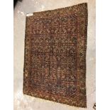 AN ANTIQUE FEREGHAN RUG. 190 x 145cms