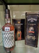 WHISKY:A TIN BOXED LITRE BOTTLE OF JACK DANIELS, A LITRE BOTTLE OF SOUTHERN COMFORT TOGETHER WITH